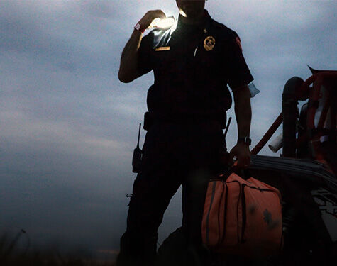 officer wearing guardian angel safety light