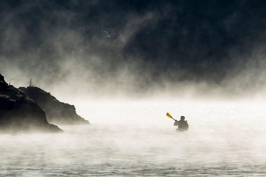 Kayaking in foggy conditions