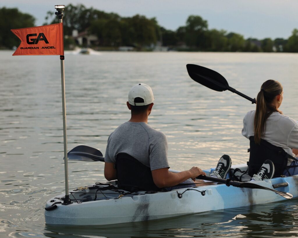 Guardian Angel flag on the back of a kayak